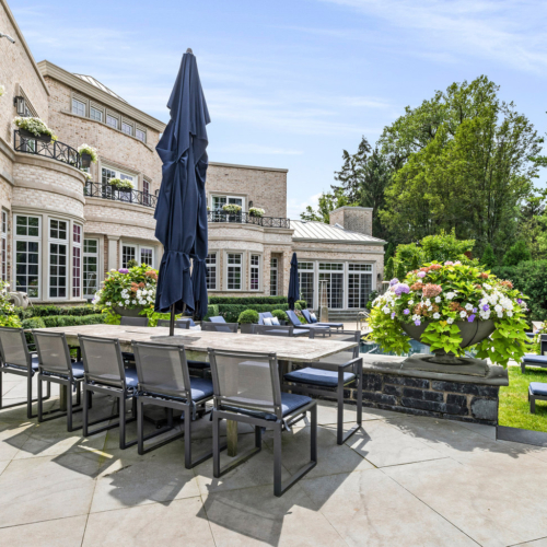 Image of the backyard of a transitional signature estate home built by Michael Bennett Homes®
